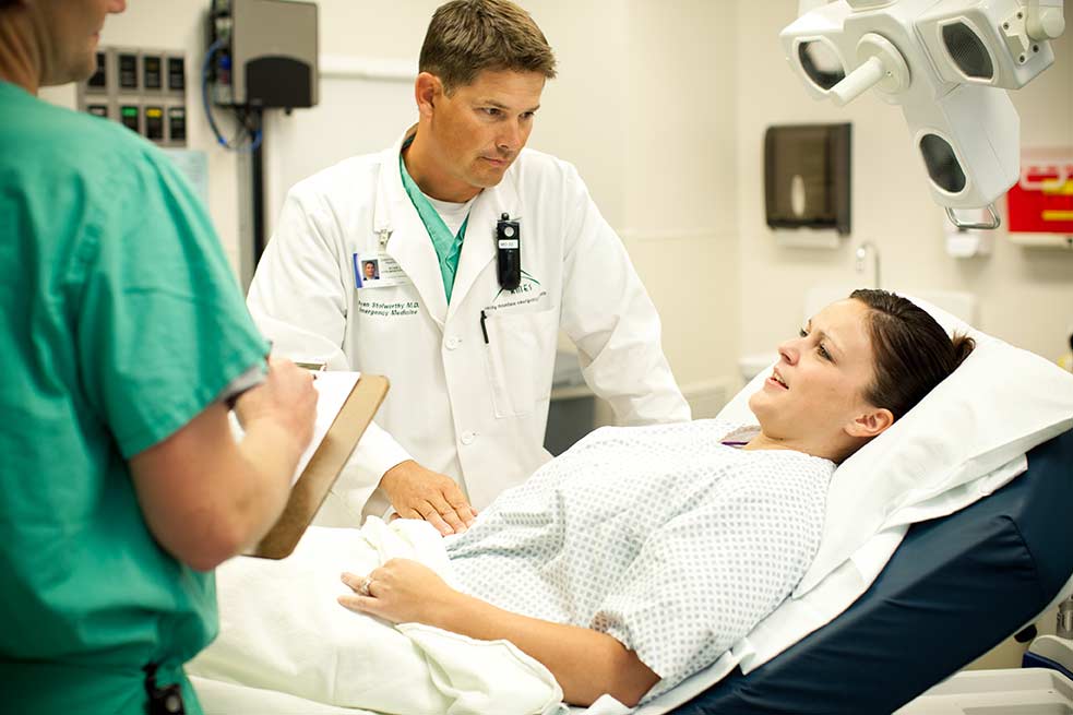 doctor-bedside-female-patient.jpg